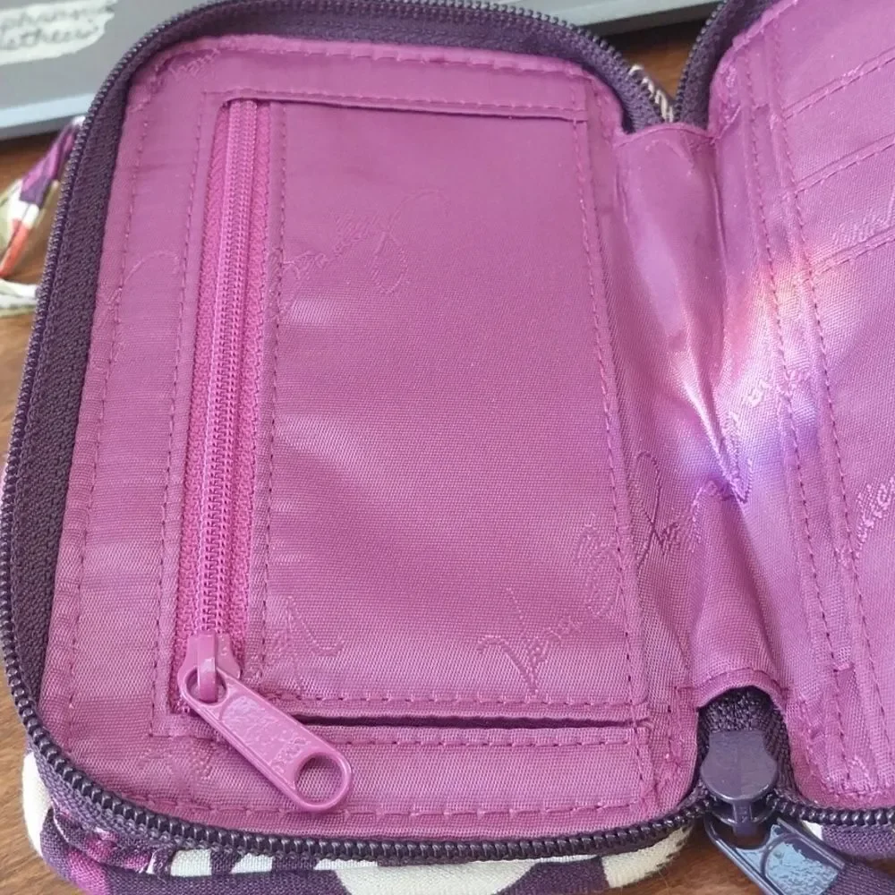 Vera Bradley  Cosmetic Case  and Wristlet.  They are both excellent condition.